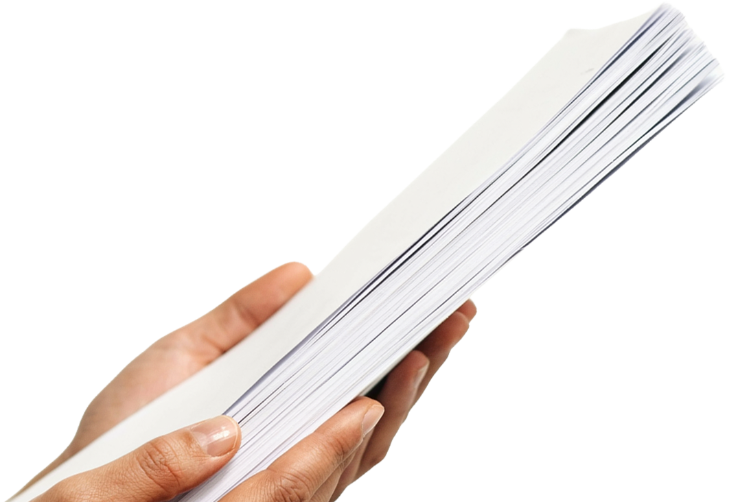 Hands holding a stack of finished documents